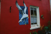 Peinture sur le mur d'une maison à Eyeries. © Philip Plisson / Plisson La Trinité / AA02349 - Nos reportages photos - Irlande, l'île verte