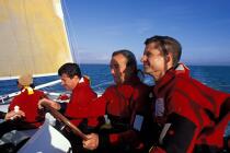Eric Tabarly, Alain Thébault and Jean Le Cam on Hydroptère © Philip Plisson / Plisson La Trinité / AA04239 - Photo Galleries - Sailing Race