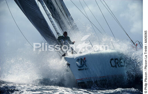 Philippe Jeantot à bord de son monocoque Crédit Agricole. - © Philip Plisson / Plisson La Trinité / AA06065 - Photo Galleries - Sailing Race