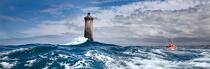 Lifeboat in front of Le Four lighthouse. © Philip Plisson / Plisson La Trinité / AA23134 - Photo Galleries - Sea rescuer