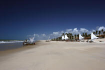 Jangadas on a beach of Caponga. © Philip Plisson / Plisson La Trinité / AA10180 - Photo Galleries - Blue sky