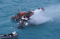Fire at the start of the Route du Rhum © Philip Plisson / Plisson La Trinité / AA35542 - Photo Galleries - Lifeboat society
